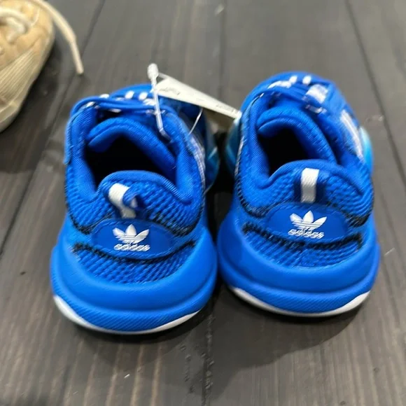 Toddler size 4 shoes. Sperry and Adidas. Adidas are nwt.selling separately.